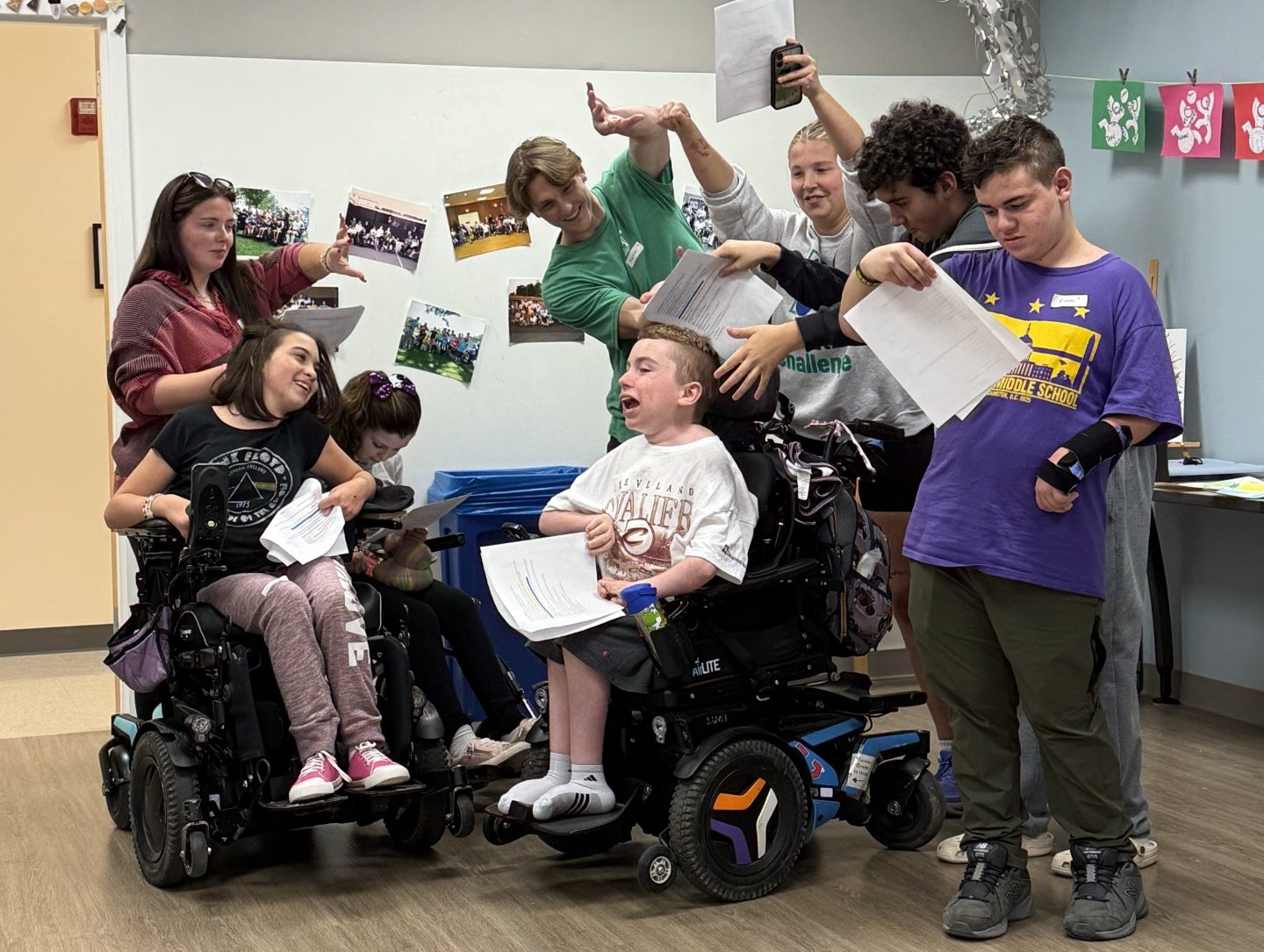 YC Participants and Volunteers excitedly rehearsing their skit for the 2026 Holiday Show in the art room.